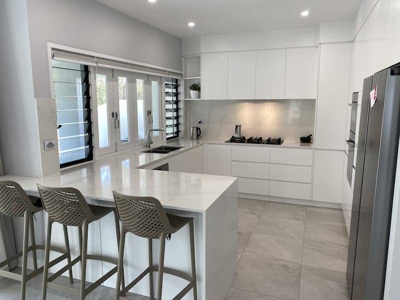 White cabinets and stone kitchen Coolum Qld