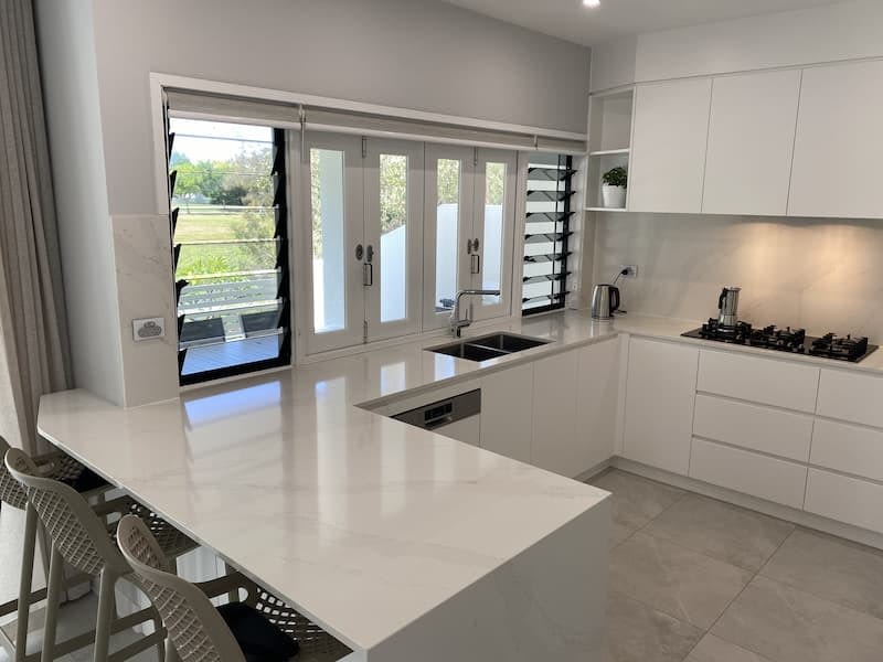 White cabinets and stone kitchen Coolum Qld